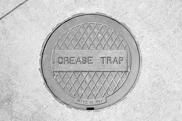 the capacity of your grease trap can be determined by consulting with a professional and inspecting the trap's size and usage